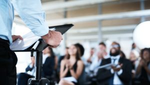 Shot of a businessman giving a presentation at a conference